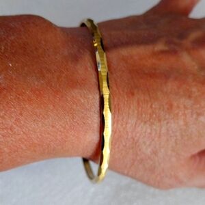 Monet gold tone bangle bracelet.